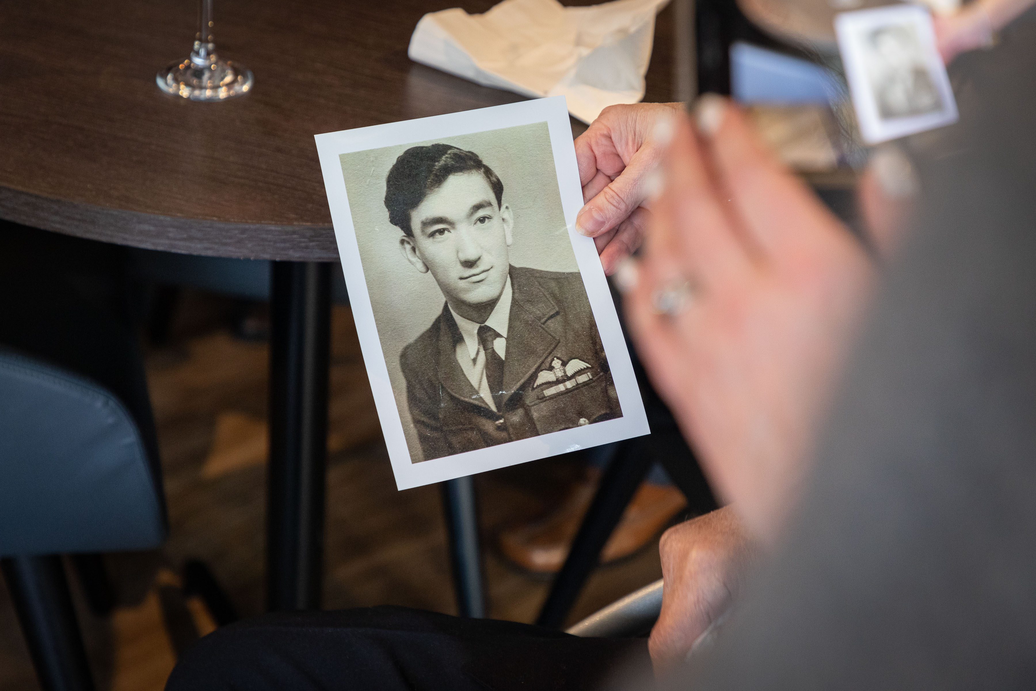 Image shows black and white picture of RAF aviator.
